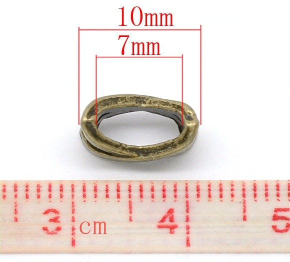 10 bronze slider spacer beads - 10mm x 7mm - bronze slider bead for leather cord or bracelet (13445)
