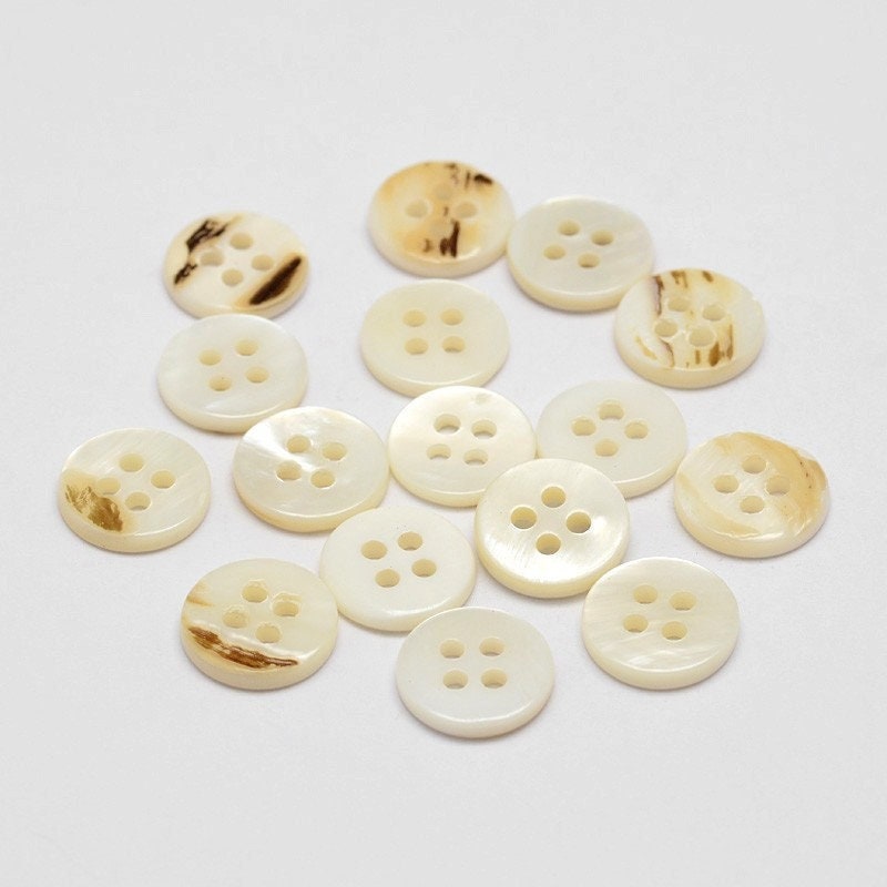 Shell buttons - 11mm x 2mm - 4 hole - flat natural shell buttons - hole:  1.5mm (p01206)